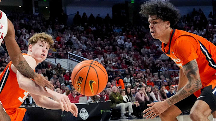 Nov 20, 2024; Birmingham, AL, USA; Alabama forward Derrion Reid (35), Illinois guard Kasparas Jakucionis (32) and Illinois forward Will Riley (7) struggle to control a loose ball in the CM Newton Classic at Legacy Arena. Mandatory Credit: Gary Cosby Jr.-Tuscaloosa News