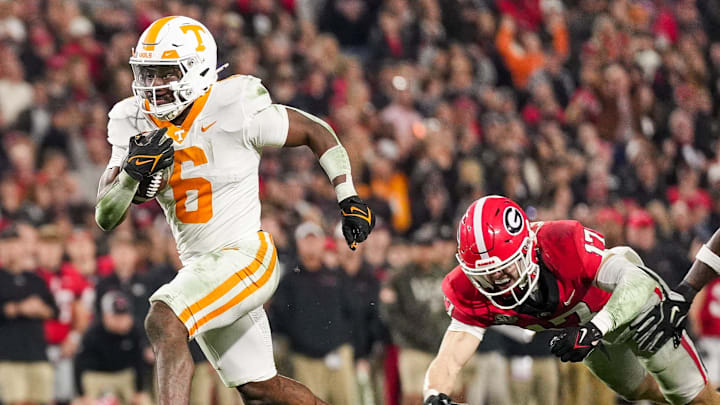 Tennessee running back Dylan Sampson (6) leaves Georgia defensive back Dan Jackson (17) behind as he strides into the end zone for a touchdown during a college football game between Tennessee and Georgia at Sanford Stadium in Athens, Ga., on Saturday, November 16, 2024. Tennessee running back Dylan Sampson (6) leaves Georgia defensive back Dan Jackson (17) behind as he strides into the end zone for a touchdown during a college football game between Tennessee and Georgia at Sanford Stadium in Athens, Ga., on Saturday, November 16, 2024.