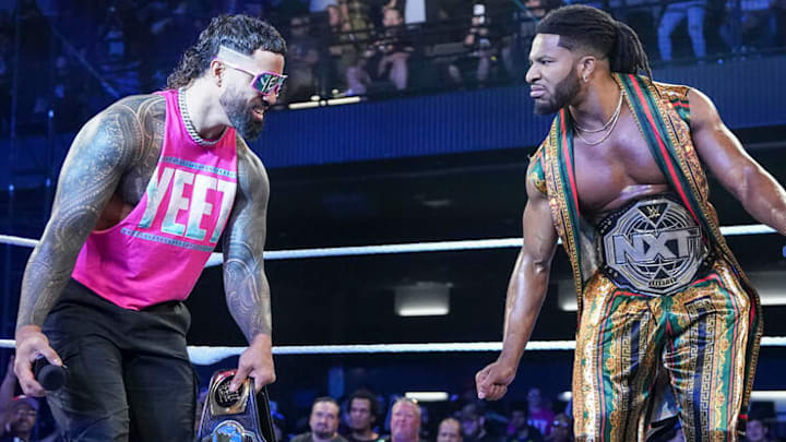 WWE Intercontinental Champion Jey Uso (left) celebrates with NXT Heavyweight Champion Trick Wiliams (right). WWE Intercontinental Champion Jey Uso (left) celebrates with NXT Heavyweight Champion Trick Wiliams (right).