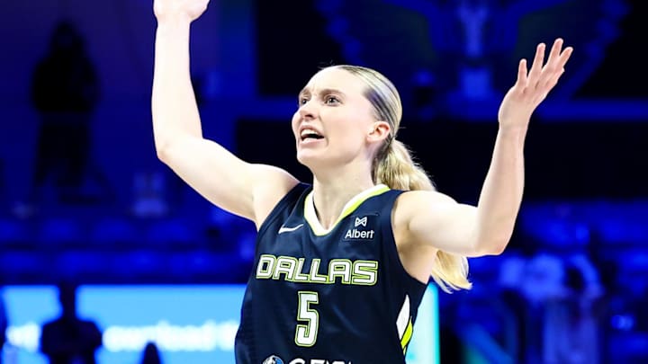Jul 30, 2025; Arlington, Texas, USA;  Dallas Wings guard Paige Bueckers (5) reacts  against the Atlanta Dream during the second half at College Park Center. Mandatory Credit: Kevin Jairaj-Imagn Images