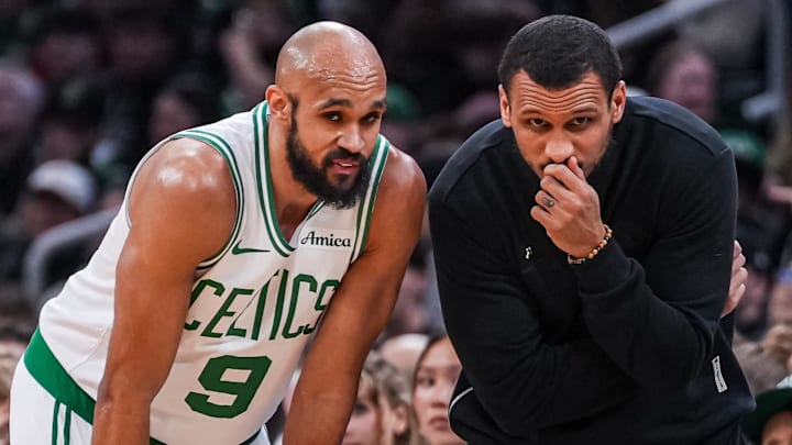 Apr 7, 2026; Boston, Massachusetts, USA; Boston Celtics head coach Joe Mazzulla with guard Derrick White (9) from the sideline as they take on the Charlotte Hornets at TD Garden. Mandatory Credit: David Butler II-Imagn Images