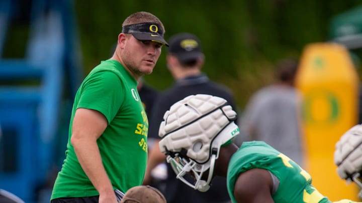 Oregon defensive coordinator Tosh Lupoi watches over practice with the Ducks Wednesday, Aug. 17, 2022, in Eugene, Ore.

Lupoi