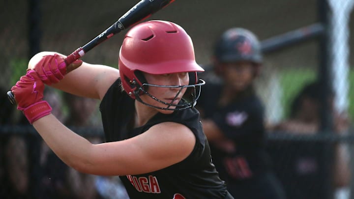 Iowa City High’s Molly Carlson, 20, warms up before taking an at bat against Waterloo West Thursday, July 11, 2024 in Iowa City, Iowa. Iowa City High’s Molly Carlson, 20, warms up before taking an at bat against Waterloo West Thursday, July 11, 2024 in Iowa City, Iowa.