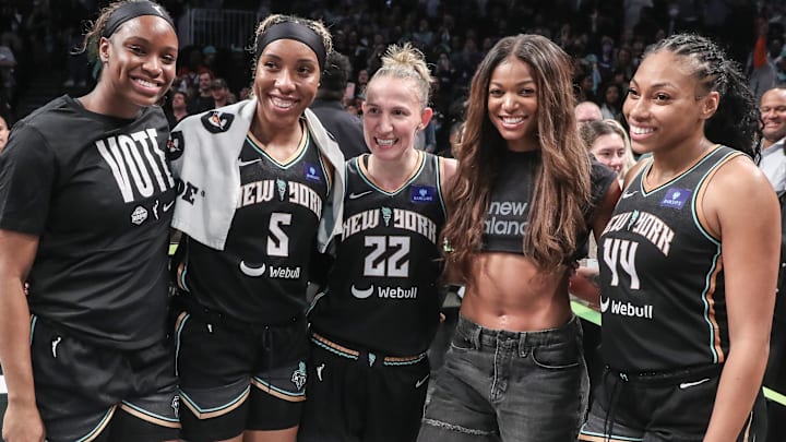 Track and field sprinter Gabby Thomas poses with New York Liberty players after game two of the first round of the 2024 WNBA Playoffs against the Atlanta Dream at Barclays Center. Track and field sprinter Gabby Thomas poses with New York Liberty players after game two of the first round of the 2024 WNBA Playoffs against the Atlanta Dream at Barclays Center.