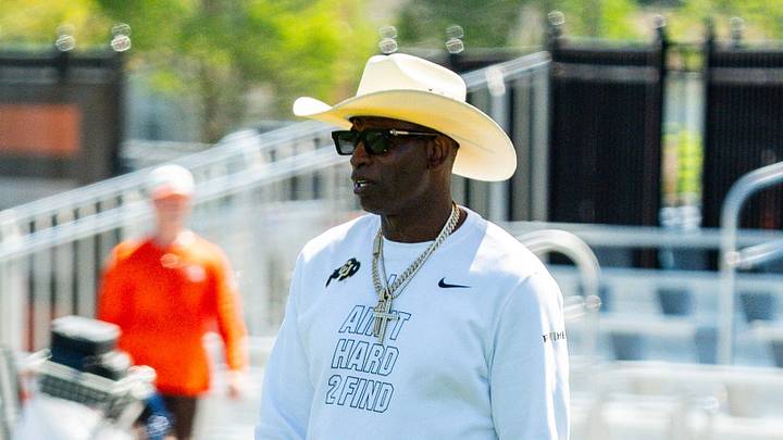 Deion Sanders spends time with his son, Cleveland Browns quarterback Shedeur Sanders (2) at the conclusion of the second day of training camp, July 30, 2026, in Berea, Ohio.
