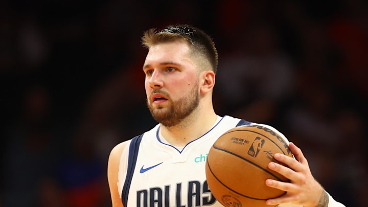 Oct 26, 2024; Phoenix, Arizona, USA; Dallas Mavericks guard Luka Doncic (77) against the Phoenix Suns at Footprint Center. Mandatory Credit: Mark J. Rebilas-Imagn Images