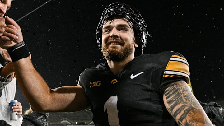 Nov 2, 2024; Iowa City, Iowa, USA; Iowa Hawkeyes quarterback Brendan Sullivan (1) reacts with fans after the game against the Wisconsin Badgers at Kinnick Stadium. Mandatory Credit: Jeffrey Becker-Imagn Images