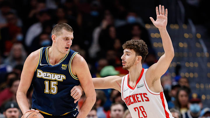 Nov 6, 2021; Denver, Colorado, USA; Denver Nuggets center Nikola Jokic (15) controls the ball as Houston Rockets center Alperen Sengun (28) guards in the third quarter at Ball Arena. Mandatory Credit: Isaiah J. Downing-Imagn Images Nov 6, 2021; Denver, Colorado, USA; Denver Nuggets center Nikola Jokic (15) controls the ball as Houston Rockets center Alperen Sengun (28) guards in the third quarter at Ball Arena. Mandatory Credit: Isaiah J. Downing-Imagn Images