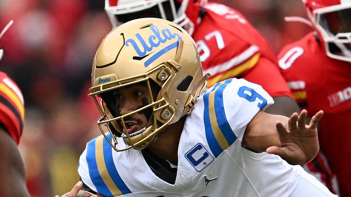 Sep 26, 2026; College Park, Maryland, USA; UCLA Bruins quarterback Nico Iamaleava (9) picks up yardage as Maryland Terrapins linebacker Carlton Smith (32) moves in for the tackle in the first half at SECU Stadium. Mandatory Credit: Jamie Sabau-Imagn Images Sep 26, 2026; College Park, Maryland, USA; UCLA Bruins quarterback Nico Iamaleava (9) picks up yardage as Maryland Terrapins linebacker Carlton Smith (32) moves in for the tackle in the first half at SECU Stadium. Mandatory Credit: Jamie Sabau-Imagn Images