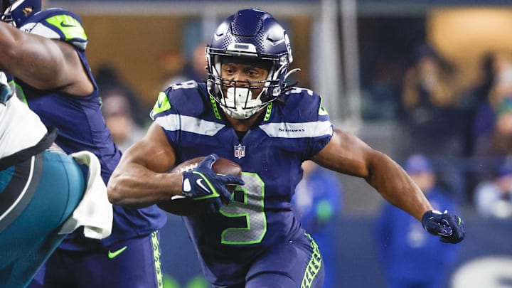 Dec 18, 2023; Seattle, Washington, USA; Seattle Seahawks running back Kenneth Walker III (9) rushes against the Philadelphia Eagles during the second quarter at Lumen Field. Mandatory Credit: Joe Nicholson-Imagn Images