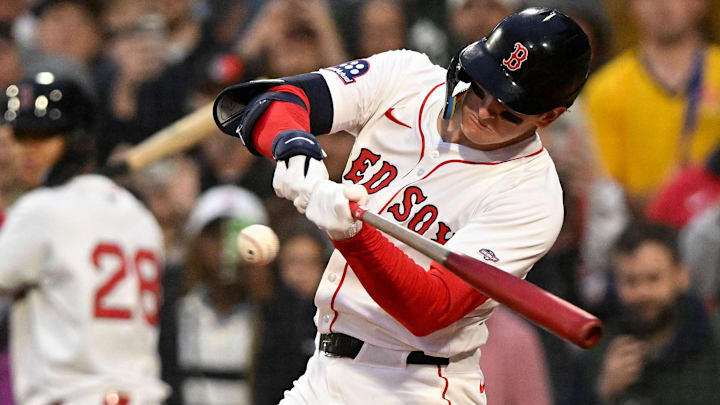 Boston Red Sox right fielder Roman Anthony hits a fly out to left field during the second inning of a game against the Tampa Bay Rays at Fenway Park.