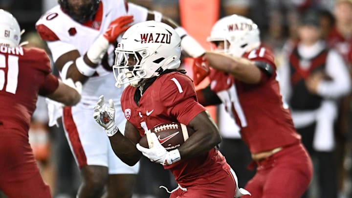 Sep 6, 2025; Pullman, Washington, USA; Washington State Cougars running back Angel Johnson (1) carries the ball against the San Diego State Aztecs in the first half at Gesa Field at Martin Stadium. Mandatory Credit: James Snook-Imagn Images