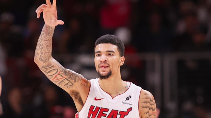 Feb 20, 2026; Atlanta, Georgia, USA; Miami Heat center Kel'el Ware (7) celebrates with guard Tyler Herro (14) after a basket against the Atlanta Hawks in the fourth quarter at State Farm Arena. Mandatory Credit: Brett Davis-Imagn Images
