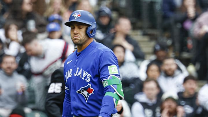 Apr 4, 2026; Chicago, Illinois, USA; Toronto Blue Jays designated hitter George Springer (4) reacts after striking out against the Chicago White Sox during the ninth inning at Rate Field. Mandatory Credit: Kamil Krzaczynski-Imagn Images