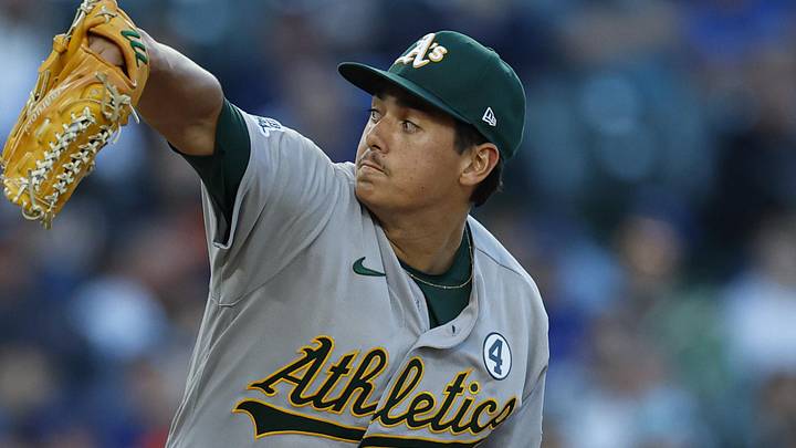 Jun 2, 2026; Chicago, Illinois, USA; Athletics starting pitcher Gage Jump (61) delivers a pitch against the Chicago Cubs during the first inning at Wrigley Field. Mandatory Credit: Kamil Krzaczynski-Imagn Images