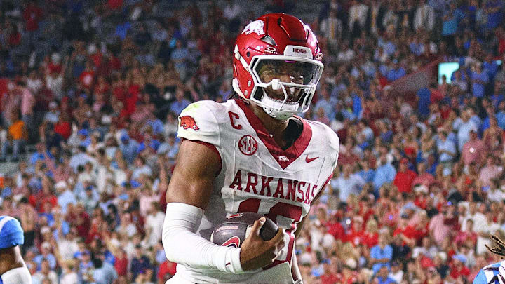 Arkansas Razorbacks quarterback Taylen Green (10) runs the ball for a touchdown during the second quarter against the Ole Miss Rebels at Vaught-Hemingway Stadium. 