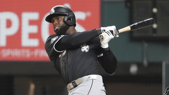Chicago White Sox outfielder Luis Robert Jr. (88) swings against the Texas Rangers at Globe Life Field. 