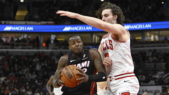 Feb 4, 2025; Chicago, Illinois, USA;  Miami Heat guard Terry Rozier (2) drives to the basket Chicago Bulls guard Josh Giddey (3) during the second half at United Center. Mandatory Credit: Matt Marton-Imagn Images