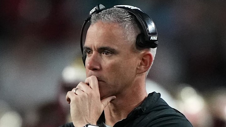 Dec 30, 2023; Miami Gardens, FL, USA; Florida State Seminoles head coach Mike Norvell reacts against the Georgia Bulldogs during the second half in the 2023 Orange Bowl at Hard Rock Stadium. Mandatory Credit: Jasen Vinlove-Imagn Images