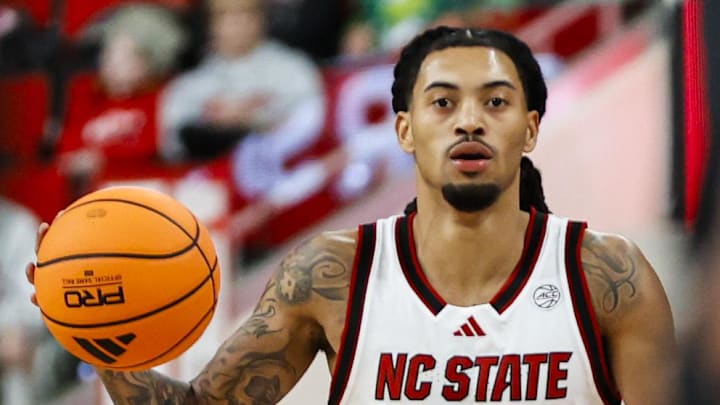 Dec 6, 2025; Raleigh, North Carolina, USA; NC State Wolfpack guard Alyn Breed (7) dribbles down the court during the first half of the game against UNC Asheville Bulldogs at Lenovo Center. Mandatory Credit: Jaylynn Nash-Imagn Images