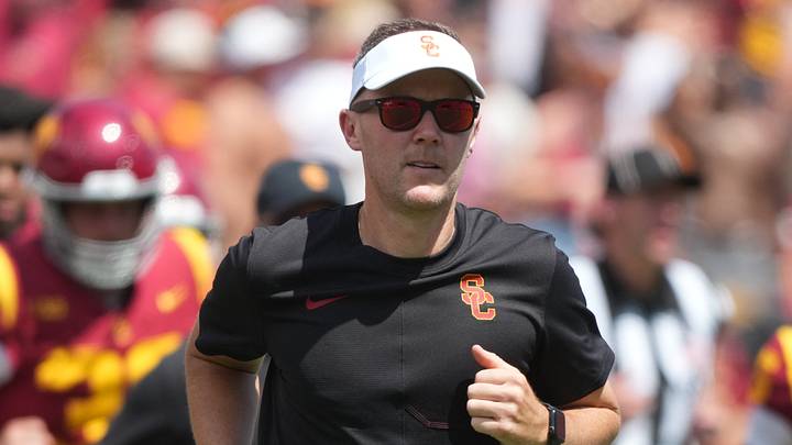 Aug 29, 2026; Los Angeles, California, USA;  USC Trojans head coach Lincoln Riley head coach Lincoln Riley Lincoln Riley Riley enters the field before the game against the San José State Spartans at United Airlines Field at Los Angeles Memorial Coliseum.  Mandatory Credit: Kirby Lee-Imagn Images