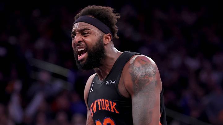 Dec 19, 2025; New York, New York, USA; New York Knicks center Mitchell Robinson (23) reacts after a dunk against the Philadelphia 76ers during the second quarter at Madison Square Garden. Mandatory Credit: Brad Penner-Imagn Images