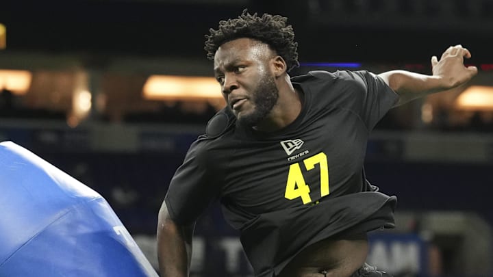 UCF defensive lineman Nyjalik Kelly goes through drills at the Scouting Combine. UCF defensive lineman Nyjalik Kelly goes through drills at the Scouting Combine.