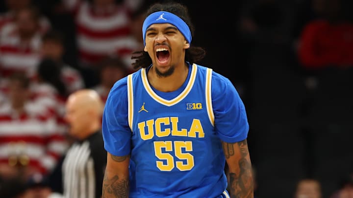 Dec 14, 2024; Phoenix, Arizona, USA; UCLA Bruins guard Skyy Clark (55) celebrates against the Arizona Wildcats in the first half at Footprint Center. Mandatory Credit: Mark J. Rebilas-Imagn Images