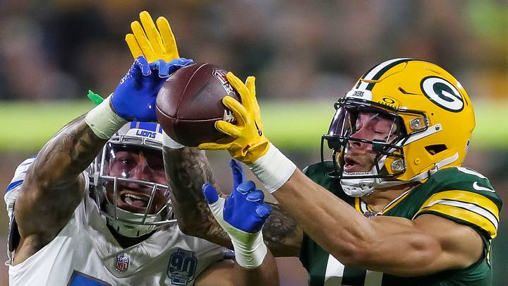 Sep 28, 2023; Green Bay, Wisconsin, USA; Detroit Lions safety Brian Branch (32) breaks up a pass intended for Green Bay Packers wide receiver Christian Watson (9) during their football game on Thursday, September 28, 2023, at Lambeau Field in Green Bay, Wis. Mandatory Credit: Tork Mason-USA TODAY Sports Sep 28, 2023; Green Bay, Wisconsin, USA; Detroit Lions safety Brian Branch (32) breaks up a pass intended for Green Bay Packers wide receiver Christian Watson (9) during their football game on Thursday, September 28, 2023, at Lambeau Field in Green Bay, Wis. Mandatory Credit: Tork Mason-USA TODAY Sports
