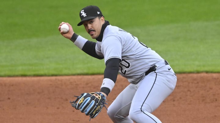 Chicago White Sox third baseman Miguel Vargas (20) throws to first. Chicago White Sox third baseman Miguel Vargas (20) throws to first.