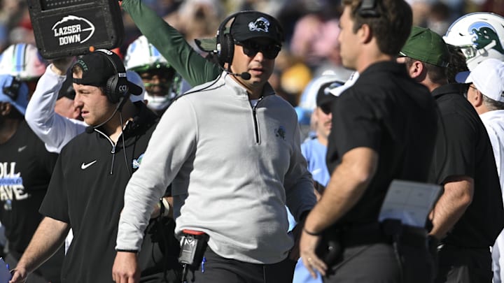 Nov 16, 2024; Annapolis, Maryland, USA; Tulane Green Wave head coach Jon Sumrall walks down the sidelines during the first half against the Navy Midshipmen at Navy-Marine Corps Memorial Stadium Nov 16, 2024; Annapolis, Maryland, USA; Tulane Green Wave head coach Jon Sumrall walks down the sidelines during the first half against the Navy Midshipmen at Navy-Marine Corps Memorial Stadium