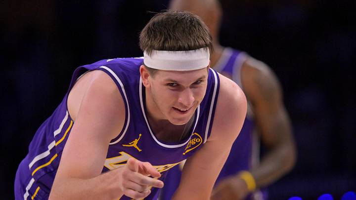 Feb 5, 2026; Los Angeles, California, USA;  Los Angeles Lakers guard Austin Reaves (15) reacts after a foul in the second half against the Philadelphia 76ers at Crypto.com Arena. Mandatory Credit: Jayne Kamin-Oncea-Imagn Images