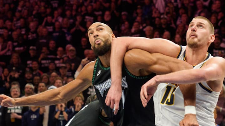 Apr 25, 2026; Minneapolis, Minnesota, USA; Minnesota Timberwolves center Rudy Gobert (27) and Denver Nuggets center Nikola Jokic (15) position themselves for a rebound in the fourth quarter at Target Center. Mandatory Credit: Matt Blewett-Imagn Images