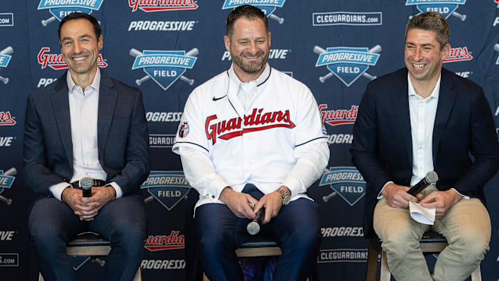 Nov 10, 2023; Cleveland, OH, USA; Cleveland Guardians manager Stephen Vogt, middle, and president of baseball operations Chris Antonetti, left, and general manager Mike Chernoff, right, talk to the media during an introductory press conference at Progressive Field. Mandatory Credit: Ken Blaze-Imagn Images
Nov 10, 2023; Cleveland, OH, USA; Cleveland Guardians manager Stephen Vogt, middle, and president of baseball operations Chris Antonetti, left, and general manager Mike Chernoff, right, talk to the media during an introductory press conference at Progressive Field. Mandatory Credit: Ken Blaze-Imagn Images
