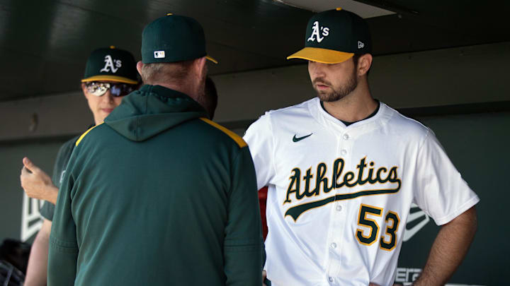 May 7, 2025; West Sacramento, California, USA; Athletics starting pitcher Gunnar Hoglund (53) confers with pitching coach Scott Emerson during the second inning against the Seattle Mariners at Sutter Health Park. Mandatory Credit: D. Ross Cameron-Imagn Images May 7, 2025; West Sacramento, California, USA; Athletics starting pitcher Gunnar Hoglund (53) confers with pitching coach Scott Emerson during the second inning against the Seattle Mariners at Sutter Health Park. Mandatory Credit: D. Ross Cameron-Imagn Images