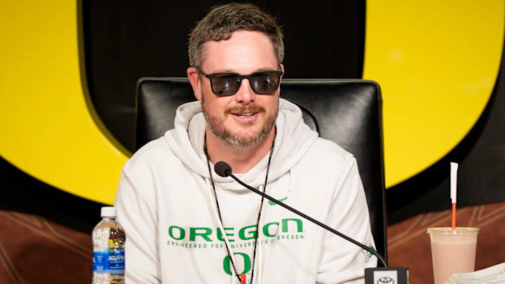 Oregon head coach Dan Lanning speaks from the podium at the Hatfield-Dowlin Complex on the first day of spring practice for the Oregon Ducks on March 12, 2026, in Eugene, Oregon.
