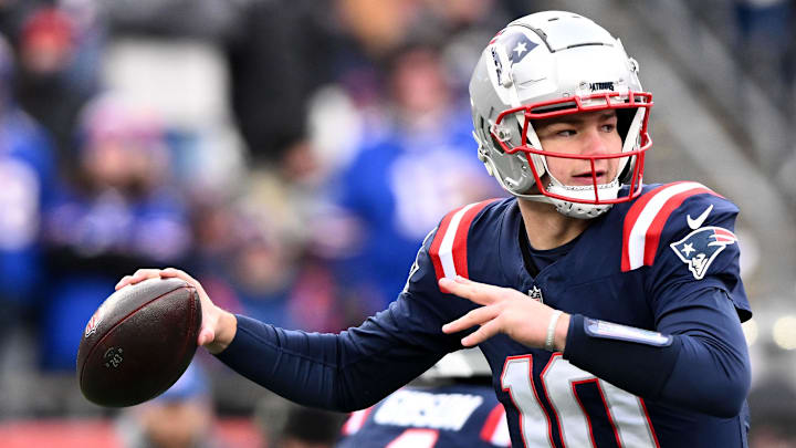 Jan 5, 2025; Foxborough, Massachusetts, USA; New England Patriots quarterback Drake Maye (10) looks to throw against the Buffalo Bills during the first half at Gillette Stadium. Mandatory Credit: Brian Fluharty-Imagn Images