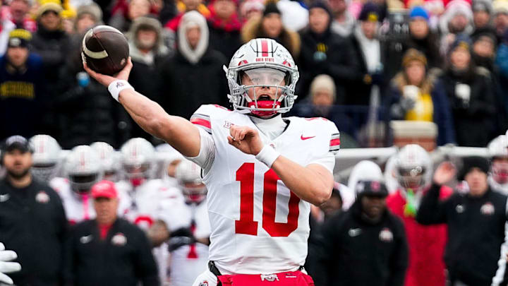 Ohio State Buckeyes quarterback Julian Sayin (10) makes a pass against the Michigan Wolverines in the first half of the NCAA football game at Michigan Stadium on Saturday, Nov. 29, 2025 in Ann Arbor, Michigan.