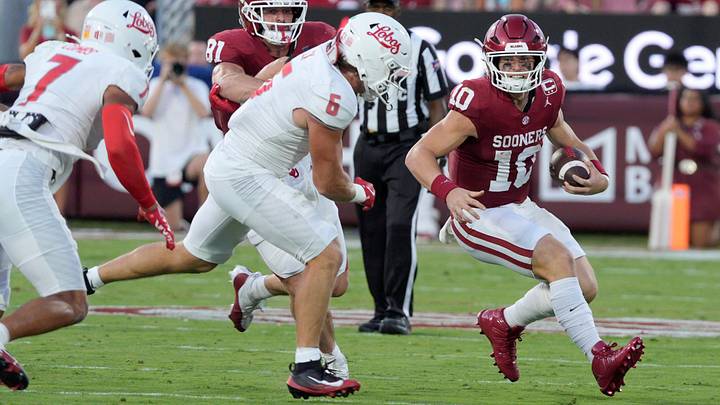 Oklahoma quarterback John Mateer caries the ball against New Mexico. Oklahoma quarterback John Mateer caries the ball against New Mexico.