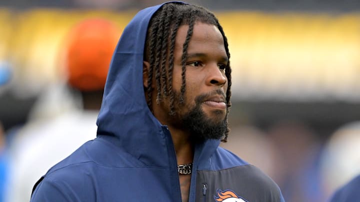 Sep 21, 2025; Inglewood, California, USA;  Denver Broncos linebacker Dre Greenlaw (57) on the sidelines prior to the game against the Los Angeles Chargers at SoFi Stadium. Mandatory Credit: Jayne Kamin-Oncea-Imagn Images