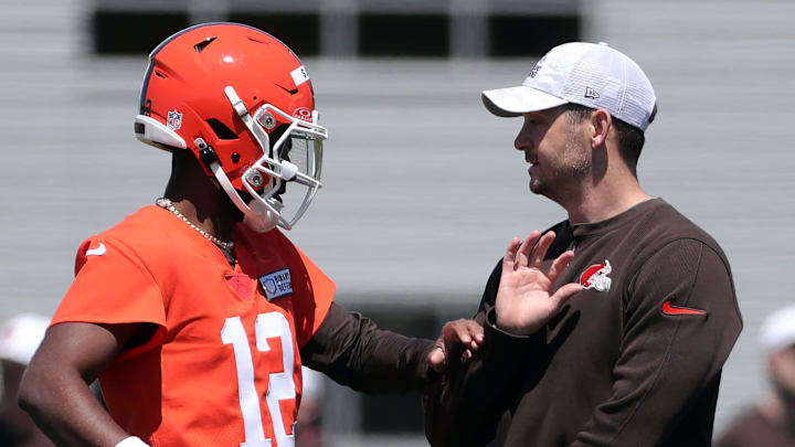 Browns quarterback Shedeur Sanders works with offensive coordinator Tommy Rees during rookie minicamp May 9, 2025, in Berea. Browns quarterback Shedeur Sanders works with offensive coordinator Tommy Rees during rookie minicamp May 9, 2025, in Berea.