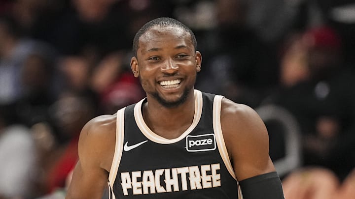 Feb 26, 2026; Atlanta, Georgia, USA; Atlanta Hawks forward Jonathan Kuminga (0) reacts after making a three point shot against the Washington Wizards during the first half at State Farm Arena.