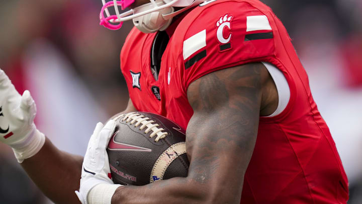 Oct 25, 2025; Cincinnati, Ohio, USA;  Cincinnati Bearcats running back Evan Pryor (6) runs with the ball against the Baylor Bears in the first half at Nippert Stadium. Mandatory Credit: Aaron Doster-Imagn Images