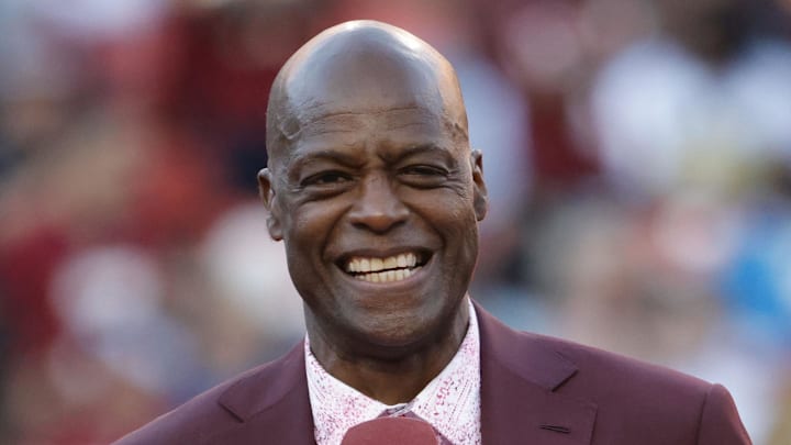 Oct 20, 2024; Landover, Maryland, USA; Former Washington Commanders Darrell Green speaks during a halftime celebration for his jersey retirement at Northwest Stadium against the Carolina Panthers. Mandatory Credit: Amber Searls-Imagn Images