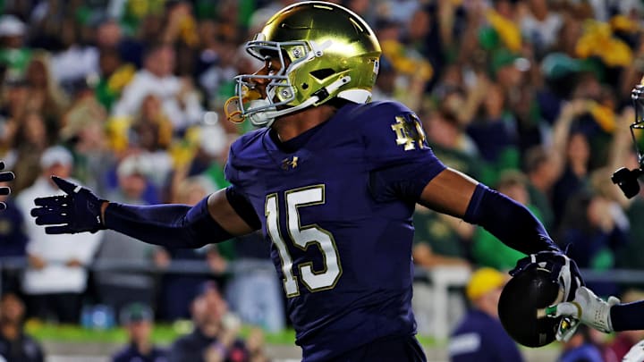 Sep 13, 2025; South Bend, Indiana, USA; Notre Dame Fighting Irish cornerback Leonard Moore (15) reacts after a play against the Texas A&M Aggies during the first half at Notre Dame Stadium. Sep 13, 2025; South Bend, Indiana, USA; Notre Dame Fighting Irish cornerback Leonard Moore (15) reacts after a play against the Texas A&M Aggies during the first half at Notre Dame Stadium.