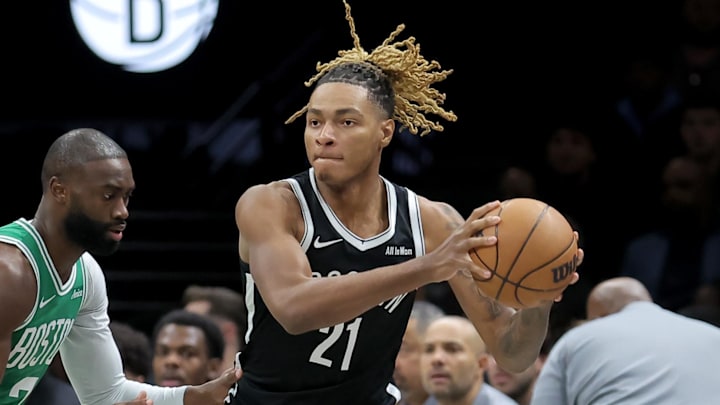 Nov 18, 2025; Brooklyn, New York, USA; Brooklyn Nets forward Noah Clowney (21) looks to pass the ball against Boston Celtics guard Jaylen Brown (7) during the first quarter at Barclays Center. Mandatory Credit: Brad Penner-Imagn Images Nov 18, 2025; Brooklyn, New York, USA; Brooklyn Nets forward Noah Clowney (21) looks to pass the ball against Boston Celtics guard Jaylen Brown (7) during the first quarter at Barclays Center. Mandatory Credit: Brad Penner-Imagn Images