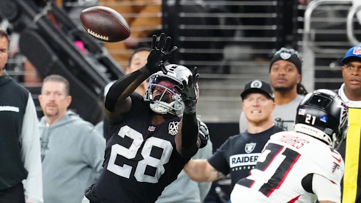Dec 16, 2024; Paradise, Nevada, USA; Las Vegas Raiders running back Sincere McCormick (28) makes a catch against the Atlanta Falcons during the second quarter at Allegiant Stadium. Mandatory Credit: Stephen R. Sylvanie-Imagn Images