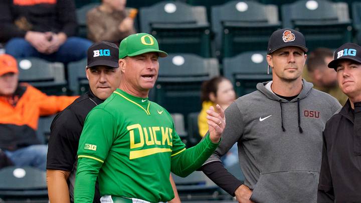 Oregon head coach Mark Wasikowski, second from left, and Oregon State head coach Mitch Canham, third from left, meet with umpires before the game as the Oregon Ducks host the Oregon State Beavers on March 3, 2026, at PK Park in Eugene, Oregon. Oregon head coach Mark Wasikowski, second from left, and Oregon State head coach Mitch Canham, third from left, meet with umpires before the game as the Oregon Ducks host the Oregon State Beavers on March 3, 2026, at PK Park in Eugene, Oregon.