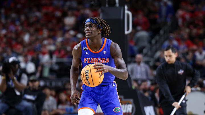 Denzel Aberdeen runs the point during the Florida Gators' win over Houston in the national championship. Denzel Aberdeen runs the point during the Florida Gators' win over Houston in the national championship.