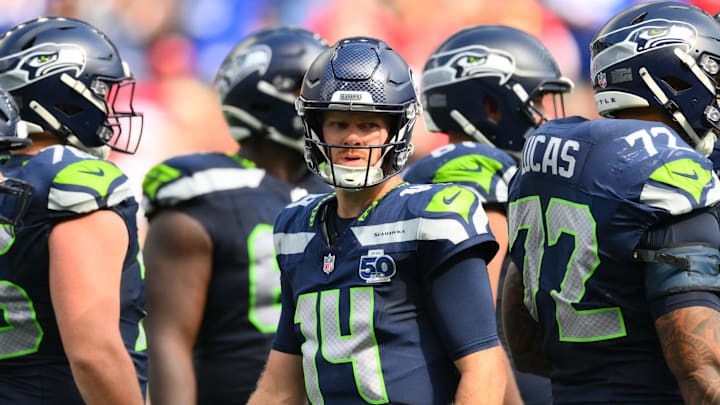 Sep 7, 2025; Seattle, Washington, USA; Seattle Seahawks quarterback Sam Darnold (14) during a TV timeout during the second half against San Francisco 49ers at Lumen Field. Mandatory Credit: Steven Bisig-Imagn Images
